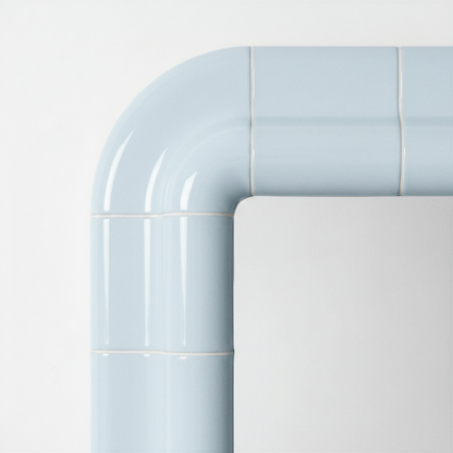 Close-up detail of the Ice Blue ceramic-look frame showing the joint lines and glossy surface.