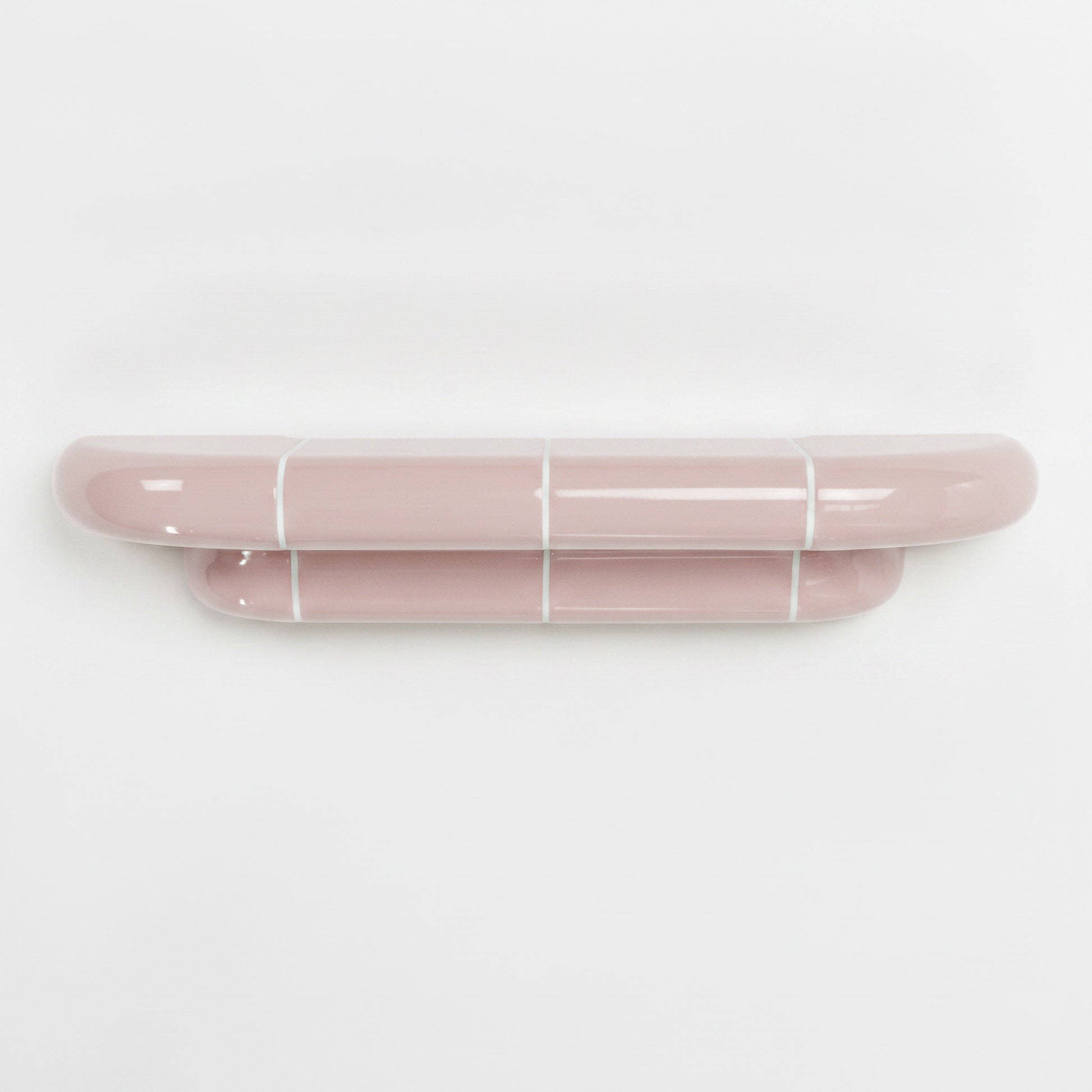 Orbi M floating shelf in glossy Blush Pink, handcrafted designer shelf with soft rounded forms.