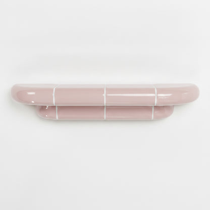 Orbi M floating shelf in glossy Blush Pink, handcrafted designer shelf with soft rounded forms.