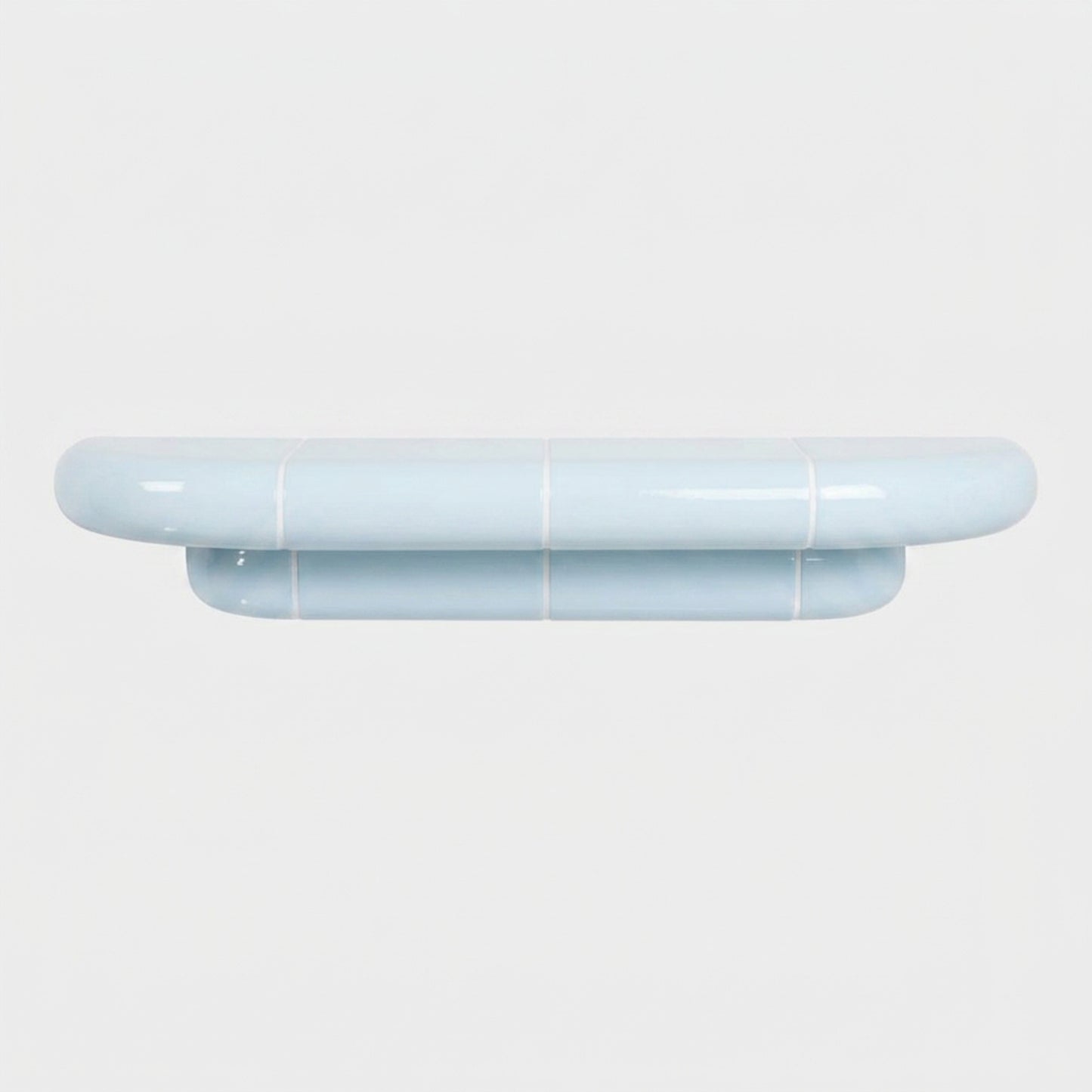 Orbi M wall shelf in glossy Ice Blue, sculptural shelf inspired by ceramic tiles.