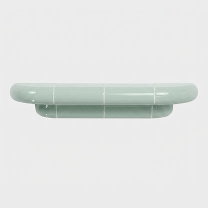 Orbi M floating shelf in glossy Pastel Mint, handcrafted designer shelf with rounded forms.