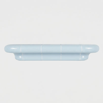 Orbi L floating wall shelf in glossy Ice Blue for contemporary interiors.