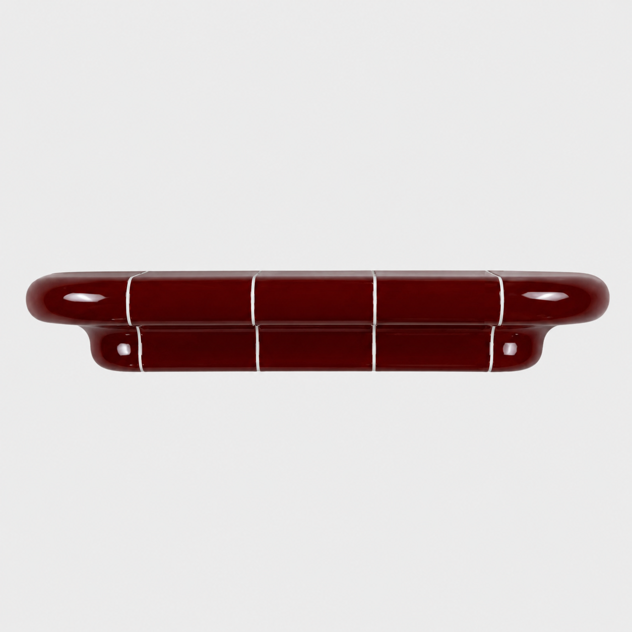 Orbi L modular shelf in glossy Deep Burgundy with ceramic-inspired rounded design.