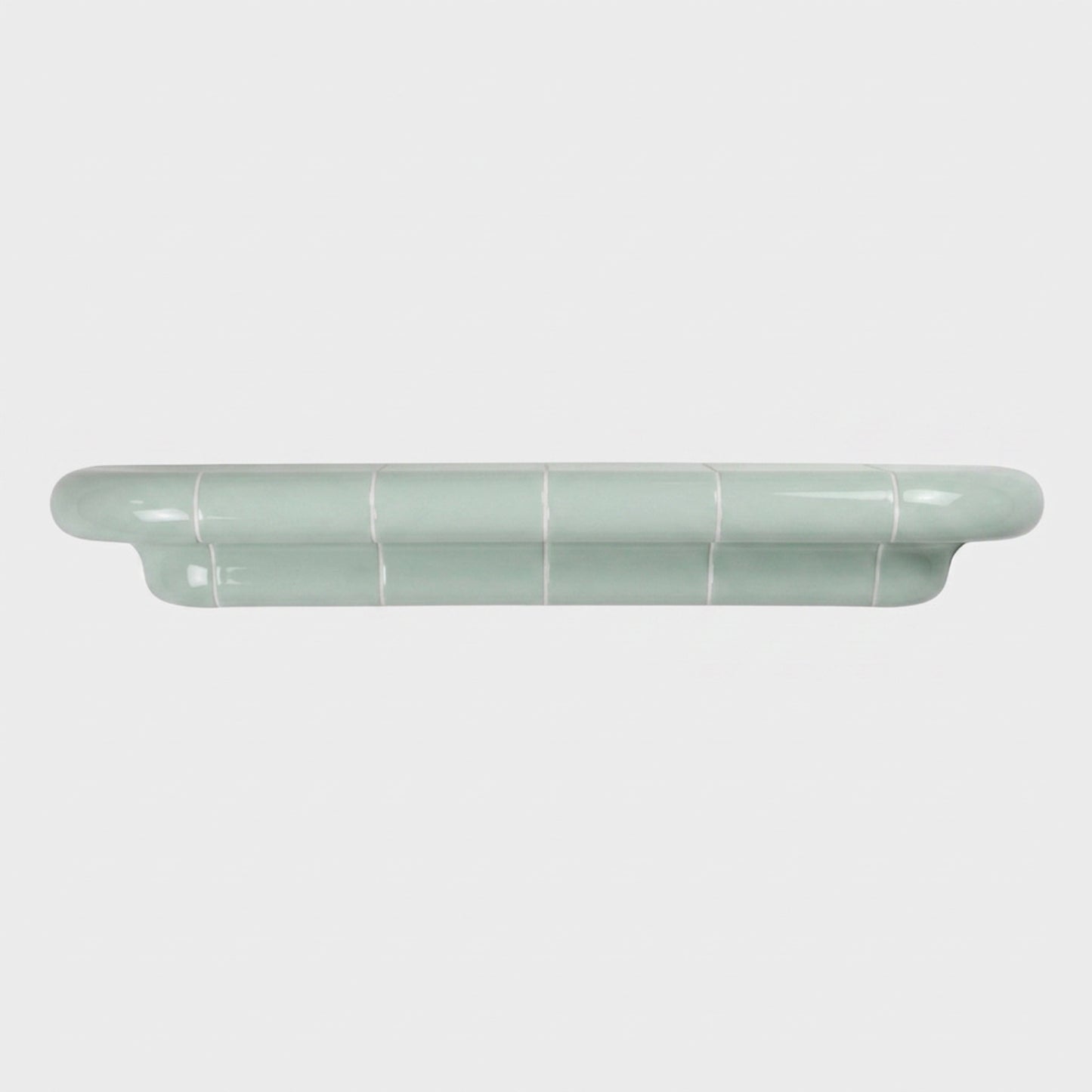 Orbi XL floating shelf in glossy Pastel Mint, statement wall shelf for modern interiors.