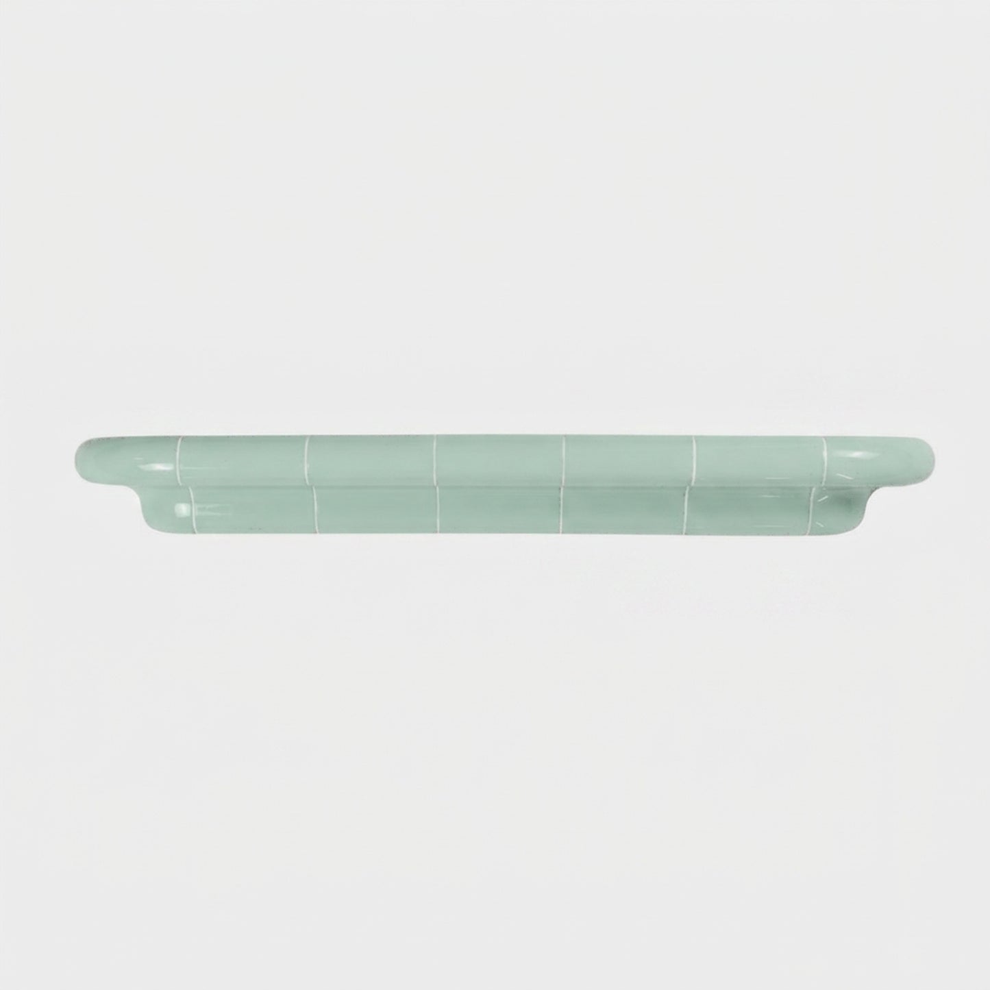 Orbi XXL extra-long floating shelf in glossy Pastel Mint, handcrafted modular wall shelf.