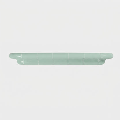 Orbi XXL extra-long floating shelf in glossy Pastel Mint, handcrafted modular wall shelf.