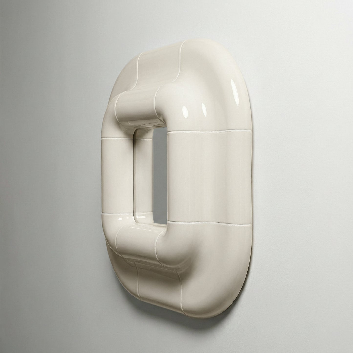 Three-quarter side view of Lolo mirror in Off-White by Tilecito, sculptural square mirror with glossy tile-inspired frame