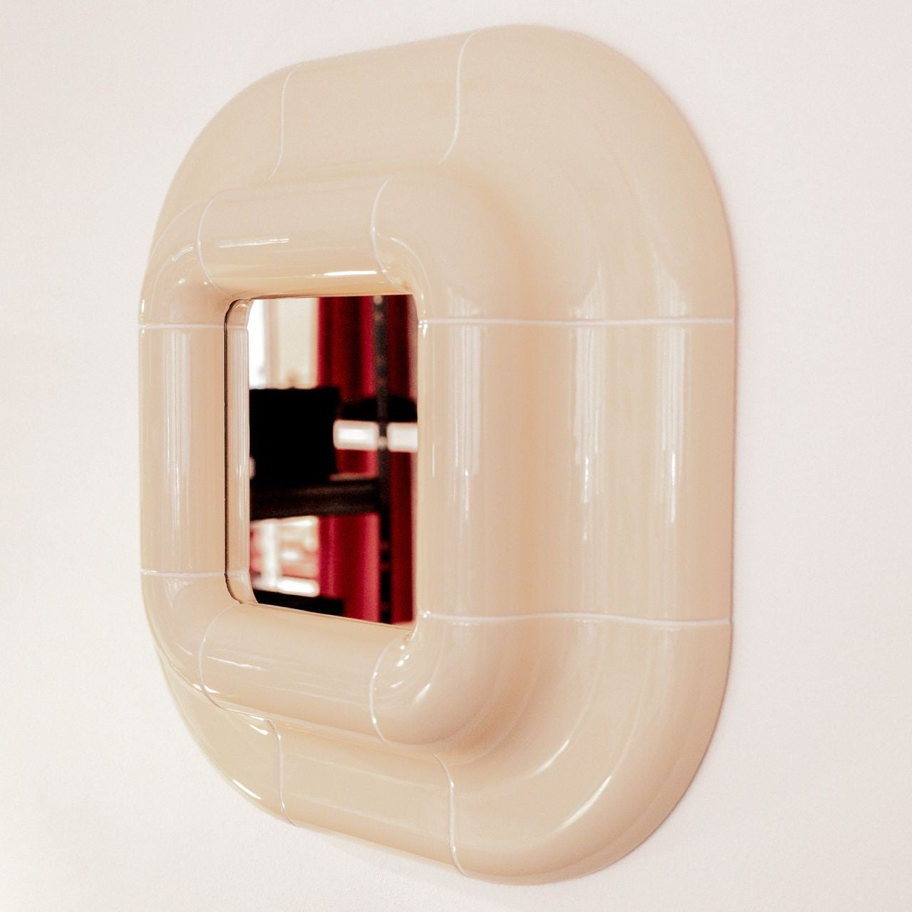 Lolo Mirror in Soft Butter photographed on a clean studio background.