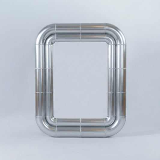 Portalito mirror in Steel finish, front view: rectangular mirror framed by a double tubular metallic structure on a light grey background